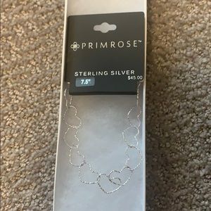Sterling silver heart bracelet. Never worn!